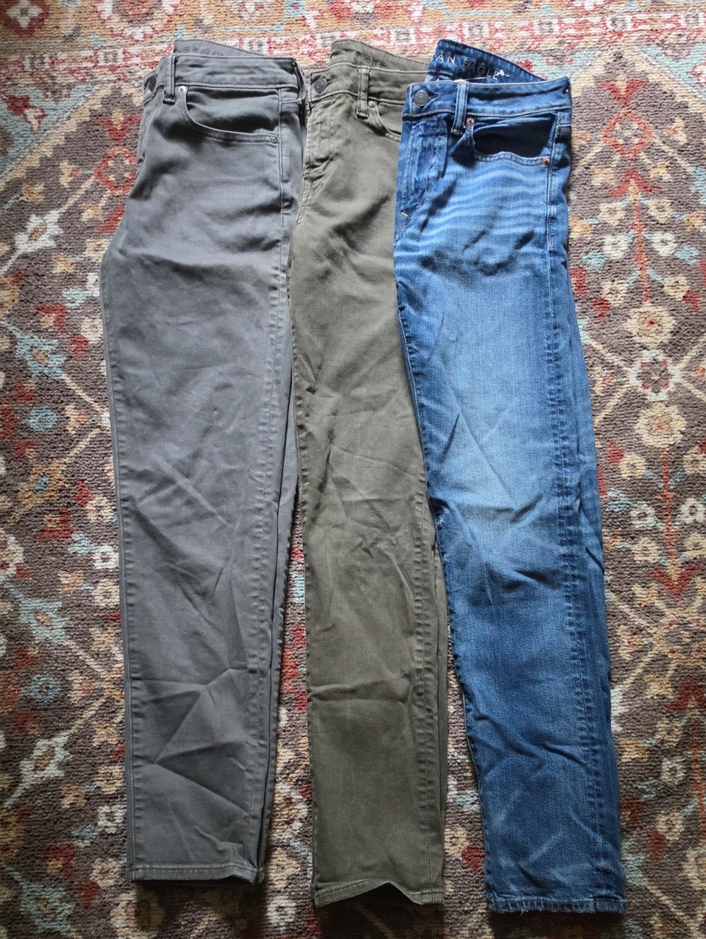 American Eagle Three-Pair Slim Jeans in Blue, Olive, and Gray 29x34